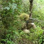 airsoft sniper in woods