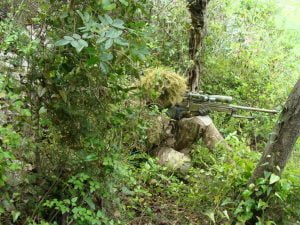 airsoft sniper in woods